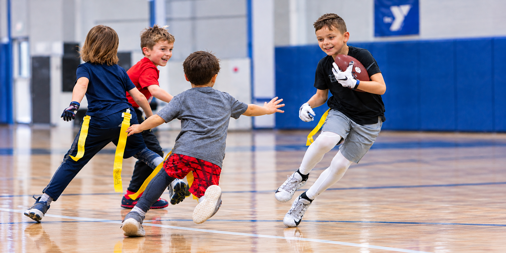 Youth Flag Football Action in the Gymnasium